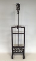 Lot 202 - A Chinese hardwood adjustable lamp stand,...