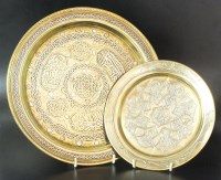 Lot 217 - A brass tray in the Islamic style, 20th...