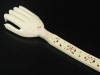 Lot 224 - An Indian sectional ivory back scratcher, in...