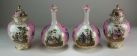 Lot 11 - A garniture of four Dresden porcelain vases...