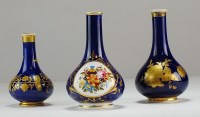 Lot 32 - Three small Derby porcelain bottle vases,...