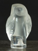 Lot 85 - A small Lalique frosted glass model of an owl,...