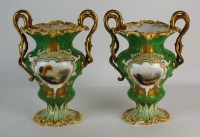 Lot 90 - A pair of Coalport apple green ground vases,...