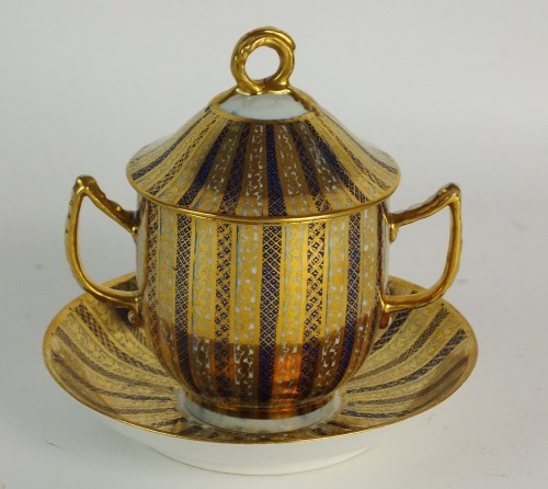 Lot 103 - A Caughley porcelain twin-handled caudle or...