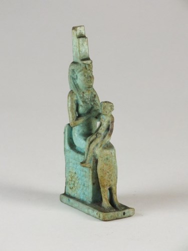 Lot 123 - An Egyptian faience model of Isis and Horus,...