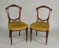 Lot 212 - A set of six late Victorian walnut dining...