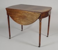 Lot 217 - A George III mahogany Pembroke table, the oval...