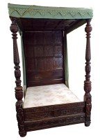 Lot 223 - A 17th century style oak four poster bed...