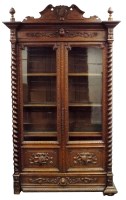 Lot 253 - A 19th century oak library bookcase, the...