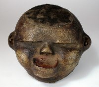 Lot 17 - An East African Makonde tribe terracotta mask...