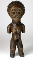 Lot 19 - A Congo female figure with half arms, bird...