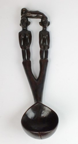 Lot 52 - A large Philippines Ifuago carved wooden...