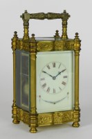 Lot 149 - A late 19th century gilt brass carriage clock,...