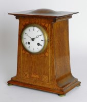 Lot 156 - An oak Art Nouveau mantel clock, convex enamel...