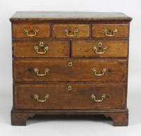 Lot 222 - A mid 18th century oak crossbanded chest of...