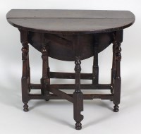 Lot 224 - An early 18th century oak gate-leg breakfast...