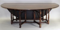 Lot 235 - A 20th century reproduction oak double...