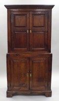 Lot 242 - An 18th century joined oak food cupboard, the...