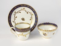 Lot 24 - A Caughley polychrome coffee cup and saucer,...