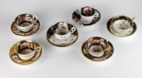 Lot 34 - English florally painted teacups and saucers,...