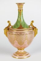 Lot 63 - A Coalport vase with twin-satyr handles, early...