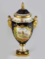 Lot 91 - A Coalport vase and cover, painted by Peter...
