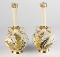 Lot 93 - A pair of Royal Worcester blush ivory vases,...