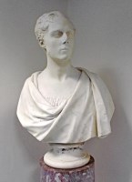 Lot 124 - An early Victorian weathered marble bust by T....
