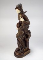 Lot 145 - A French bronze and carved ivory figure of a...