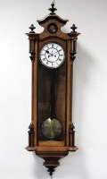 Lot 154 - A late 19th century walnut and ebonised twin...