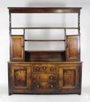 Lot 171 - An early 19th century oak high dresser,...