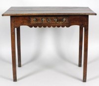 Lot 203 - An 18th century oak side table, the two plank...