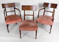 Lot 223 - A set of seven George IV mahogany dining...