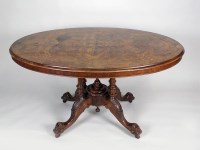 Lot 227 - A Victorian figured walnut and marquetry oval...