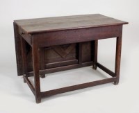 Lot 232 - A George III oak single drop-leaf dining table,...