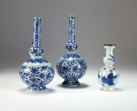 Lot 36 - A pair of Chinese blue and white bottle vases,...