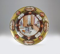 Lot 75 - A Chinese Famille Rose dessert plate, Qing,...