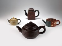 Lot 120 - Four Chinese Yixing pottery teapots, 19th/20th...