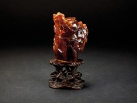 Lot 148 - A Chinese amber snuff bottle, Qing, 19th...