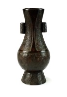 Lot 161 - A Chinese bronze arrow vase, possibly Ming, of...