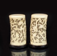 Lot 180 - A pair of Canton reticulated ivory tusk vases,...