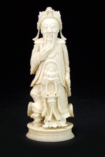 Lot 182 - A Chinese carved ivory chess piece, Qing, 19th...