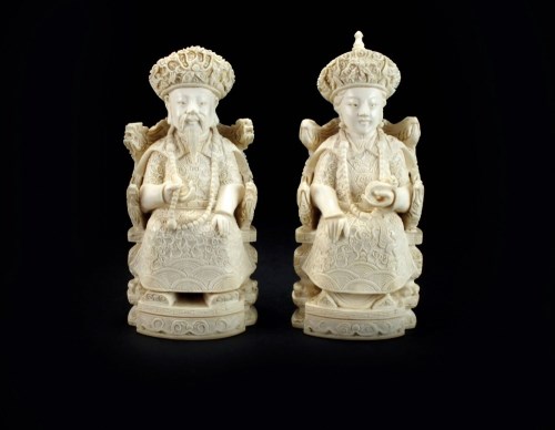 Lot 188 - A pair of Chinese ivory figures of an emperor...