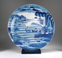 Lot 228 - A Japanese Arita blue and white charger, 19th...