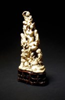 Lot 233 - A Japanese ivory okimono group of gods,...