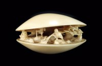 Lot 237 - A Japanese ivory okimono of a clam shell...