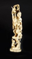 Lot 241 - A Japanese ivory okimono, Meiji period, carved...