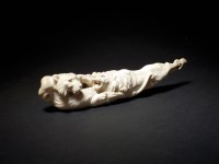 Lot 242 - A Japanese ivory okimono of a lion fighting a...
