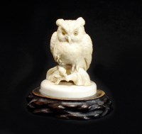Lot 243 - A Japanese ivory okimono of an owl, Taisho...