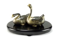 Lot 261 - A Japanese mixed metal figure group of swans,...